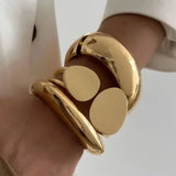 Round Disc Gold Bangle