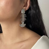 Silver fish earring
